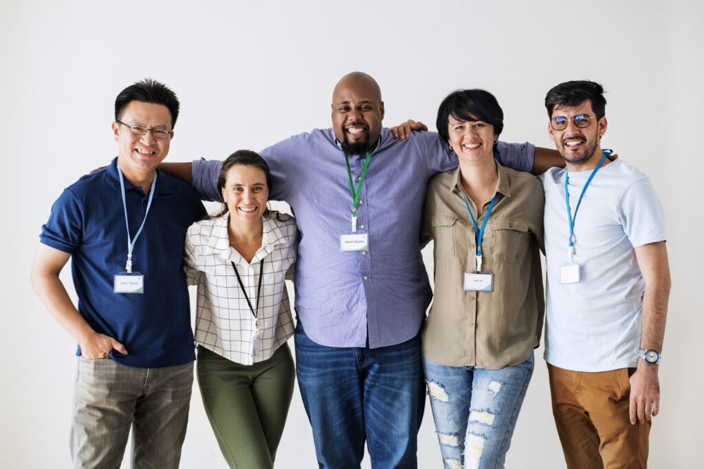 Workers standing together diversity